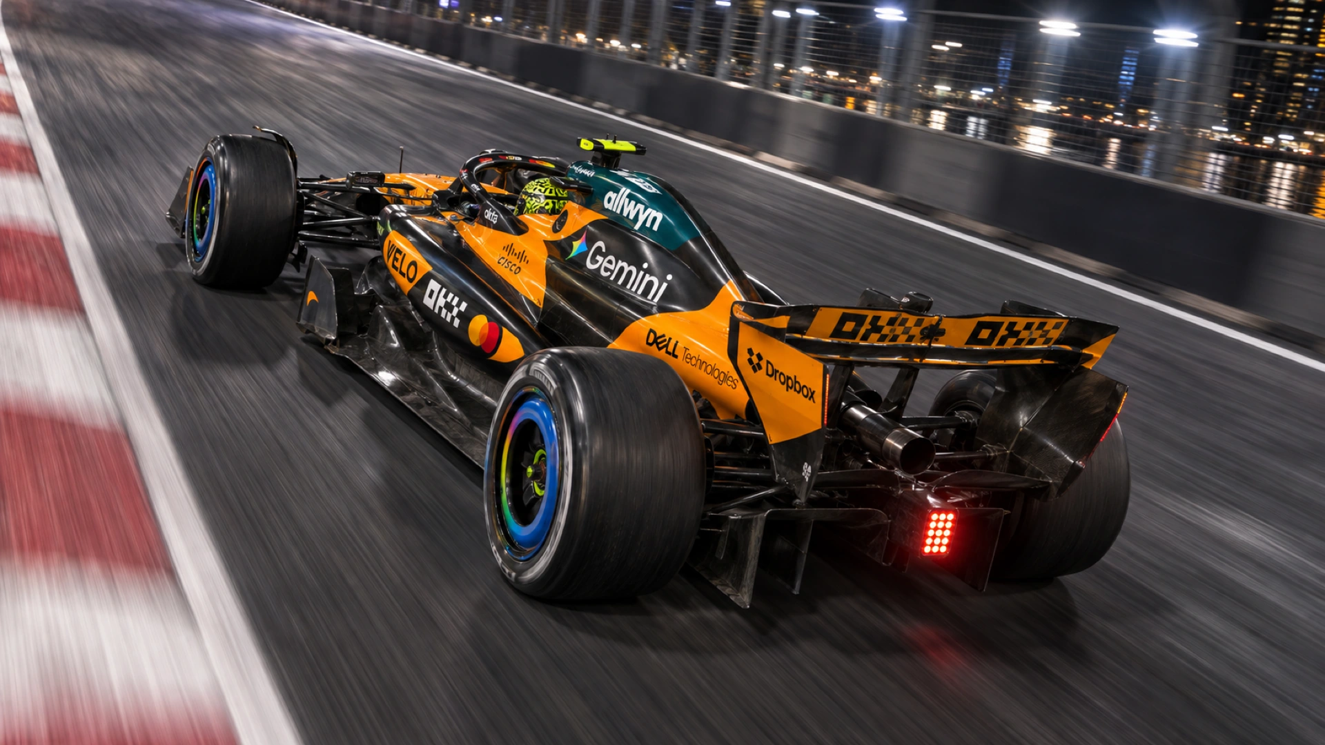 Rear tracking view of the racing car